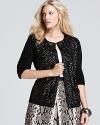 Alight with glimmering sequins, this Jones New York Collection Plus cardigan lends luxe appeal to your laid-back style.