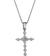 A shining reflection of your faith. This beautiful cross pendant features a delicate design accented by diamonds. Set in sterling silver. Approximate length: 18 inches. Approximate drop: 1 inch.