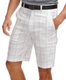 Keep your cool cruising the green in these comfortable plaid shorts from Greg Norman for Tasso Elba.