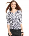 Prettily placed rhinestones and an alluring print make this top from Style&co. a hit!