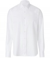 The classic white button down gets a modern twist with a faint herringbone print and a slim fit - Spread collar, long sleeves, front button placket, curved hem, slim fit - Style with a paisley blazer, straight leg jeans, and ankle boots