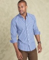 Plaid behavior. You can hide your bad-boy side beneath this preppy plaid slim-fit shirt from Tommy Hilfiger.