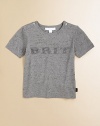 The bold Burberry Brit logo is splashed across the front of a heathery cotton tee, the embroidered letters with the sporty texture of woven rope.CrewneckShort sleevesPullover style with shoulder buttonsCottonMachine washImported