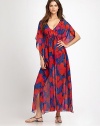 In living color, an airy, maxi dress with feminine, flutter sleeves and flattering, drawstring ties.Deep v-necklineSplit, flutter sleevesDrawstring Empire waistEngraved cord endsSilkDry cleanImported