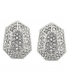 Geometric glamour. A unique trapezoid-like silhouette adds contemporary chic to Vince Camuto's stylish stud earrings. Bedecked with dazzling pave crystals, wear them day or night for serious sparkle. Set in silver tone mixed metal. Approximate diameter: 3/4.