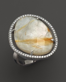 Diamonds circle a faceted yellow quartz and mother-of-pearl doublet in a sterling silver band. By Di Massima.