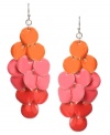 Feel the retro vibe in Haskell's dynamic drop earrings. A diamond-shaped pattern of discs in bright fuchsia and orange hues adorn a silver tone mixed metal ear wire. Approximate drop: 3 inches.