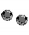 Dark and sparkly. Michael Kors' silver tone stud earrings are made of faceted hematite crystals. Approximate diameter: 1/2 inch.