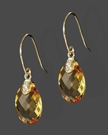 Diamonds accent faceted citrine, set in 14K yellow gold.