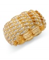 An elegant design flaunts pave glass accents on this cuff bracelet from Alfani. Crafted in gold tone mixed metal. Approximate length: 7-1/2 inches. Stretches to fit wrist.