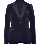 Luxurious blazer in fine, dark blue velvet adds instant elegance to any outfit - Designed in a tuxedo look with black contrasting lapels, welt pockets, and single button front - Slim cut with a feminine waist and sleeves - Looks great with a cocktail dress or silk top with skinny jeans and platform heels