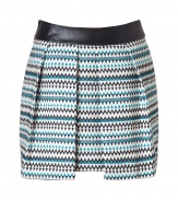 A leather waistband toughens up this bold, zigzag-printed pleated wool skirt from Milly - Wide black leather waistband, pleated, all-over zigzag print, exposed metal back zip closure - Mini length - Wear with a silk blouse, opaque tights, and embellished ballet flats