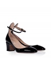 With their flawless black patent leather and sweet rounded toe, Valentinos modern cut chunky heel pumps count as a wear-everywhere must - Rounded toe, buckled ankle strap, low-cut sides, blocky heel - Pair with everything from feminine cocktail dresses to sleek ankle trousers