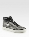 A sleek high-top style of coated leather exudes downtown-cool.Leather upperLeather liningPadded insoleRubber soleImported