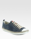 Classic lace-up design in soft suede leather.Leather upperLeather liningRubber soleImported