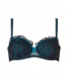 Get the sultry glamorous look of a vintage 1950s pin up girl in Von Follies by Dita Von Teeses black and deep rich turquoise stretch lace balconette bra - Underwire style with wired sides, lightly padded structured cups, grosgrain and satin ribbon detailing over sheer black stretch lace, ruffled lace trim on cups, wide adjustable straps with silver-toned hardware, iconic soft elastic triangle cross back detail, adjustable silver-toned back hook-and-eye closures - Wear with the matching G-string for a seriously seductive look