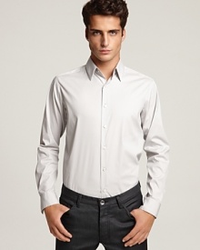 Long sleeve, button front sport shirt with point collar. Clean front, no pockets. Slim fit.