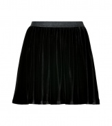 Ultra luxe with its rich black coloring, Juicy Coutures silky velvet mini-skirt counts as a must for rocker-chic looks - Shimmering elasticized waistband - Full skirt, mini-length - Wear with a graphic tee and biker boots