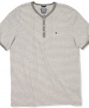 This striped henley t-shirt from Tommy Hilfiger is a solid addition to your warm-weather style.