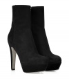 Ultra-luxe booties of soft black suede creates a sleek silhouette - Features a stylish, platform sole and a sturdy heel - Concealed side zip - Gives the illusion of a sexy, long leg - Make an edgy statement with a cocktail dress, pencil skirt, or slim jeans