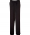 Combine comfort and trend-right style with these wide leg pants from DKNY - Elasticized waist with drawstring, straight cut wide leg, front crease detail, cuffed hem - Pair with a long sleeve henley, a boyfriend blazer, and peep-toe platforms