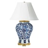 This lamp fashioned in porcelain with ornate floral pattern brings an elegant quality to any room.