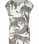 Take a walk on the wild side with Salonis eye-catching leopard printed silk top, the perfectly fashion-forward accent to polished business to cocktails looks - Rounded neckline, dolman cap sleeves, pull-over style - Easy feminine fit - Tuck into pencil skirts and finish with platform peep-toes, or try with leather leggings and statement carryall totes