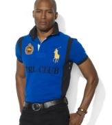 A custom-fitting PRL CLUB rugby shirt celebrating the St. Moritz Polo World Cup on Snow receives an authentic feel with Ralph Lauren's embroidered Big Pony.