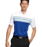 Look great on or off the golf course with this great slim fit wick away moisture golf shirt by Greg Norman for Tasso Elba.