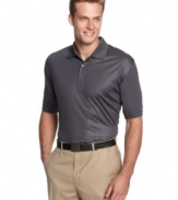 Stay and play dry in this handsome golf shirt by Greg Norman for Tasso Elba.