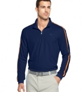 Pipe in comfort and style onto the golf course with this Puma shirt featuring moisture-management technology.