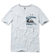 Ride the wave in this solid v-neck t-shirt with graphic front by Quiksilver.