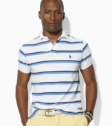 Classic stripes lend a crisp, polished look to a relaxed-fitting polo shirt in breathable cotton mesh.