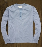 A long-sleeved jersey Henley is constructed in lightweight cotton and washed for a soft, natural fade.