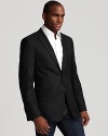 Dress it up or down. Two button sport coat with side vents. Slightly textured fabric, two front flap pockets.