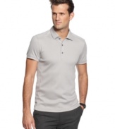 Need a style lift? This slim-fit polo shirt from Calvin Klein adds some sophisticated muscle to your polished look.