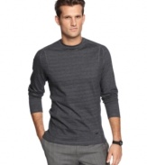 Simple and clean, this long-sleeved shirt from Calvin Klein is your best basic for summer nights.