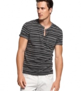 Slight distressing adds a vintage appeal to your t-shirt style with this striped henley from INC International Concepts.