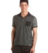 Rock the contrast. Calvin Klein Jeans takes a classic polo and gives it a modern spin.