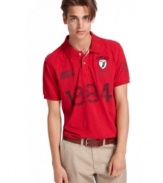 Don't let Big Brother keep tabs on your varsity style. This polo shirt from American Rag ensures your cool casual look.