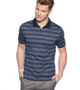 Clean up your casual look with the sleek lines of this polo shirt from Calvin Klein.