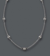 Add sparkle and shine that stretches for miles. Trio by Effy Collection necklace features seven stations of bezel-set, round-cut diamonds (1/5 ct. t.w.) strung on a delicate 14k white gold chain. Approximate length: 16 inches + 2-inch extender.