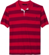 Sporty meets stylish. This striped polo shirt from Sean John scores big in your casual wardrobe.