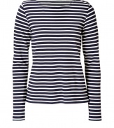 Work a nautical edge into your casual favorites with Theorys navy and white striped top - Boat neckline, long sleeves - Fitted - Wear with bright white separates and timeless leather accessories