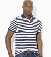 Sleek horizontal stripes lend a crisp, polished look to a relaxed-fitting polo shirt in breathable cotton mesh.