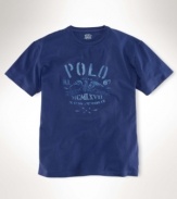 A classic-fitting cotton T-shirt with a printed vintage-inspired graphic offers superior comfort and a timeless look.