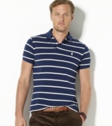 Sleek horizontal stripes lend a crisp, polished look to a relaxed-fitting polo shirt in breathable cotton mesh.