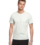 It's time to tee up this summer. Enhance your casual cool with this heathered shirt from Calvin Klein.