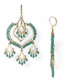 Be boldly bohemian in these pair of striking crystal-decked chandelier earrings from Aqua. Designed to dangle and dazzle, they hint at free-spirited chic.