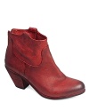 Tough, distressed leather and a Western-inspired look showcase a laid-back bootie from Sam Edelman.